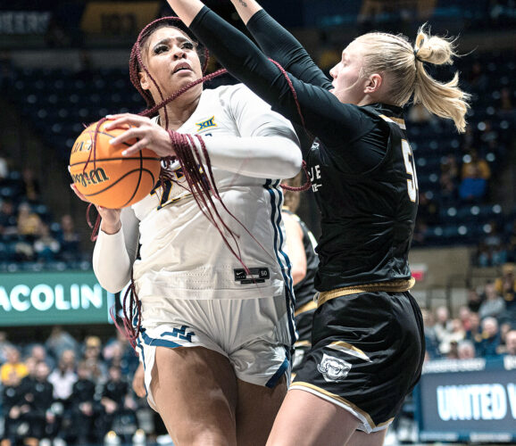 Wheeler, Thomas lead WVU women to first win